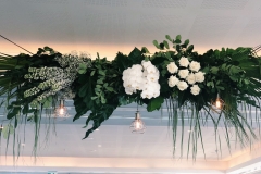 Green and white floral hanging installation 