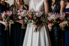 Bridal party with native bouquets